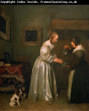 Gerard ter Borch the Younger A lady washing her hands.